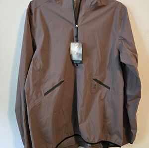 On running waterproof Anorak Size L women's gray jacket.